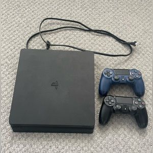Playstation 4 with two controllers